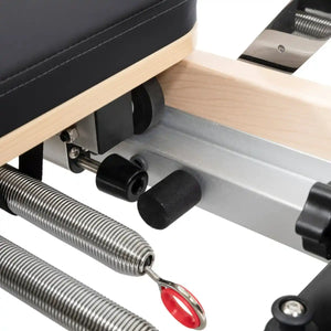 Foldable Pilates Reformer Machine: Maple Wood.
