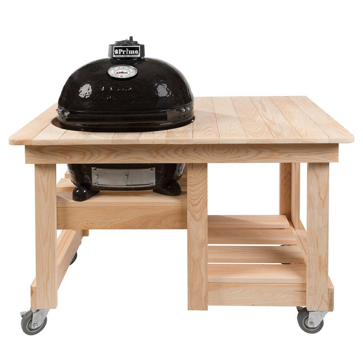 Primo Oval Junior 200 Ceramic Kamado Grill on Cypress Countertop Table.