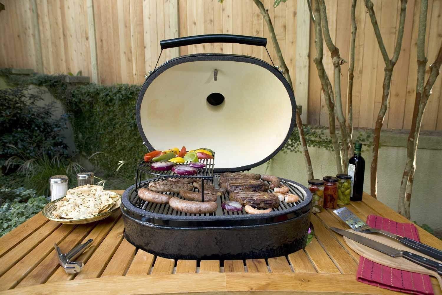 Primo Oval XL 400 Ceramic Kamado Grill on Table.